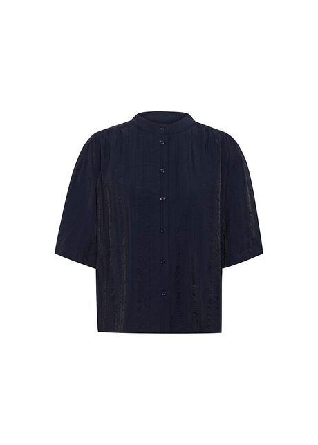 Woman s shirt soaked in luxury emine layna